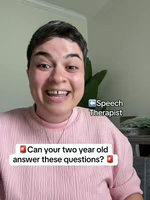 A selfie-style video featuring a woman smiling with enthusiasm. She is wearing a light pink, ribbed top. A text overlay appears in a white box with two question mark emojis at the end.