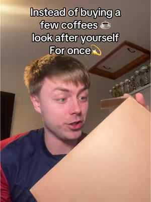 A young man looks towards the camera, holding a box. Text overlays on the top portion of the image.