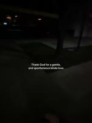The cover image is a vertical shot taken at night. The scene is dark, with only a few lights visible in the background, suggesting a street or outdoor setting. A portion of a structure or building is visible on the right side of the frame. Overlaid on the image is short, white text.
