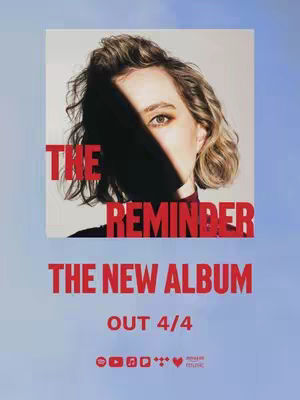 The album cover features a headshot of a woman, her face partially obscured by a dark shadow, creating a dramatic effect. The artist's eye is visible, and her hair is styled in loose waves. The album title and release details are presented in bold red text.