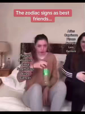 The cover image shows two young women sitting on a bed, likely in a bedroom setting. Text overlays are present, indicating this is a video about 'The zodiac signs as best friends'. The women appear to be in a casual setting, one holding a water bottle. The background is blurred, putting the focus on the subjects.