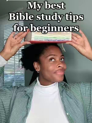 A woman with dark hair holding a stack of books on her head with her hands. Text overlay that reads 'My best Bible study tips for beginners' is at the top. She is wearing a white turtleneck and a green striped button-up shirt. The background is plain.