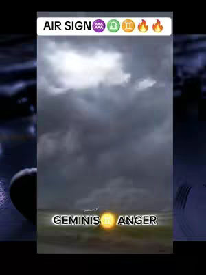 The image displays a dramatic sky with dark, ominous clouds, transitioning to lighter, more illuminated areas at the bottom. Text overlays include 'AIR SIGN' at the top and 'GEMINIS ANGER' at the bottom, accompanied by zodiac symbols and a sun-like glow.