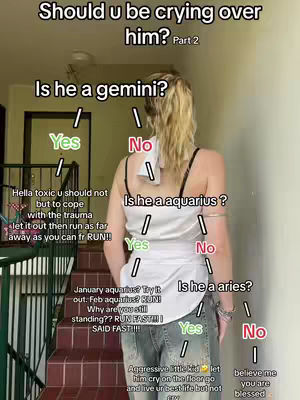 A person stands in a hallway with a staircase, facing away from the camera. Text overlays are superimposed on the image displaying relationship advice based on zodiac signs. The person is wearing a white top and jeans.