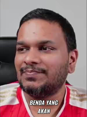 The cover image is a close-up shot of a man's face. He has dark hair and a beard. The text "BENDA YANG AKAN" is superimposed at the bottom of the image. The background appears to be a neutral color.