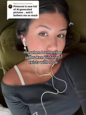 A selfie-style image featuring a woman in a black top, with visible ear buds and a light-colored strap from her top. Text overlays are present in the image. The background is a blurred mix of tan and dark green.