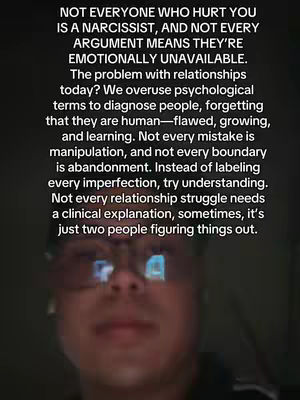 The cover image features a person's face as the main subject, with text overlayed on top of the face. The words are in a black font color, while the background is dark and blurred.