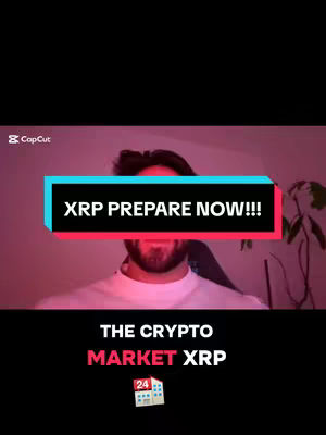 The cover image is a vertical shot featuring a man in the center, seen from the chest up. He's positioned against a backdrop that fades from a light purple at the bottom to darker tones above. A horizontal rectangular banner with black text that reads 'XRP PREPARE NOW!!!' overlays the man's face. Below this banner, at the bottom of the frame, is the text 'THE CRYPTO MARKET XRP' in a mix of white and red fonts, with a small calendar icon showing the number '24'. The overall composition is simple, with the focus on the man and the text overlay.