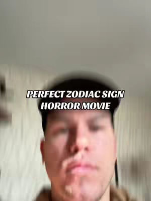 A blurry, close-up shot of a light-skinned man's face. The background is out of focus and shows indistinct patterns. Text overlays in a bold, white font.