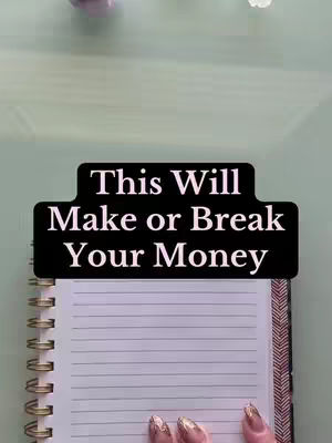 A notebook with lined paper is open. A black banner with white text overlays the top portion of the notebook, extending from both sides, and the hands of a person with gold nail polish are at the bottom. The background is a light green color.