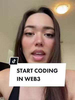 A selfie-style video with a woman in the center frame, with text overlay. The background appears to be an interior space with a ceiling light.