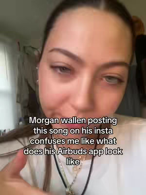 A selfie-style image showing the upper body of a young woman against an out-of-focus room background. She angles her head slightly to her right, with a questioning or surprised expression and slightly raised eyebrows. The text overlay is positioned below her face.