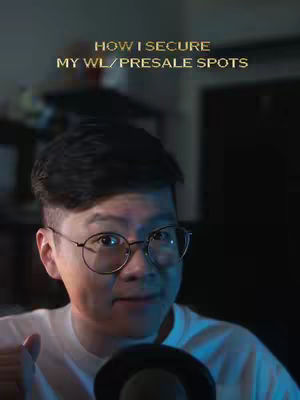 A man with glasses and a white shirt is centered in the frame, with text overlayed on his head. There is text on the top. The background is dark and out of focus, with blue and yellow lighting effects.