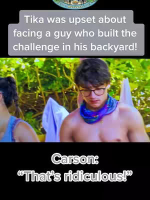 The cover image features a scene from a reality TV show. In the foreground, Carson is shirtless with a blue neck scarf and glasses, looking directly at the camera. He is in the center of the frame. Behind him is greenery and some other people. The text overlay indicates context about a specific challenge situation in the show.