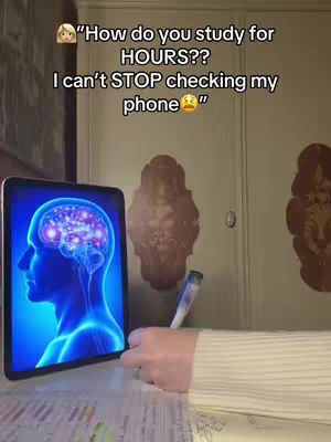 The cover photo displays a person's hand holding a pen, writing on a notebook. A tablet is visible on the left, displaying a glowing blue brain image. The background includes a door and decorative elements. Text overlays question how someone studies for hours while acknowledging difficulty staying off the phone.