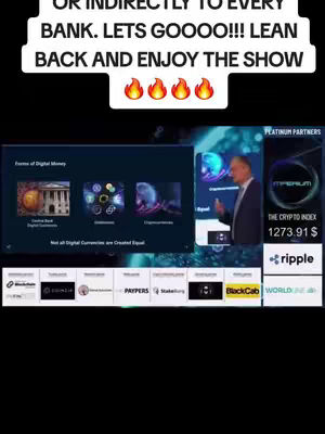 The cover image is a screenshot of a presentation screen with superimposed text. The top part has a text overlay saying, "XRP IS CONNECTED DIRECTLY OR INDIRECTLY TO EVERY BANK. LETS GOOOO!!! LEAN BACK AND ENJOY THE SHOW". Below that there are fire emojis. The presentation screen has a man speaking, charts, and data. At the bottom are logos of companies. The layout is straightforward, with the text overlay at the top and presentation content filling the rest of the frame.