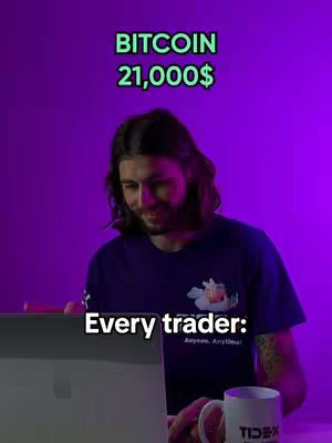 A man with long hair is sitting in front of a laptop. Above his head is text that says "Bitcoin 21,000$". Below the man is the text "Every trader:". There is a mug in front of him and the background is purple.