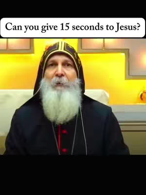 The image features an older man with a white beard wearing a hooded robe. Above him, a white rounded rectangle contains text, and the background is mostly a warm yellow color with some framed elements.