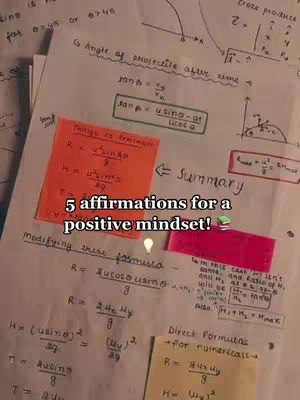 A photo of notes and formulas written on paper, with colorful sticky notes and a text overlay.