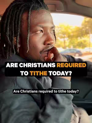 A man with dreadlocks is seen inside a car. Text overlays appear on the image. The man has a contemplative expression, with a finger touching his lip.