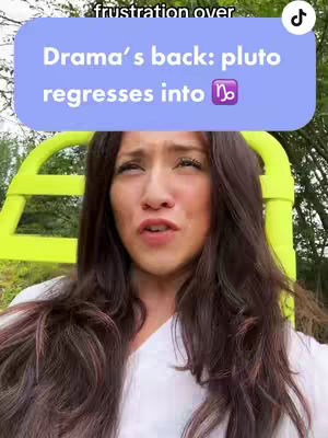 A woman with long, dark brown hair is the central focus. She's seated in a bright green chair, looking upward with a slightly concerned expression. A light purple text box with white text overlays her head, and trees and greenery are visible in the background, suggesting an outdoor setting.