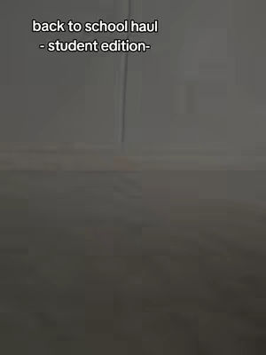 The image is a medium-shot, dark, and slightly muted. It features text overlayed at the top, against a blurry and indistinct background. The overall impression is simple and somewhat muted.