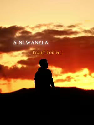 Silhouette of a person standing in front of a sunset with text overlayed. The sky is filled with orange, red, and yellow hues, creating a dramatic backdrop. A dark silhouette of a person is positioned in the center, facing away from the viewer. Darker shapes, suggesting hills or a landscape, form a base at the bottom. Text overlays appear near the top of the image, indicating a song title.