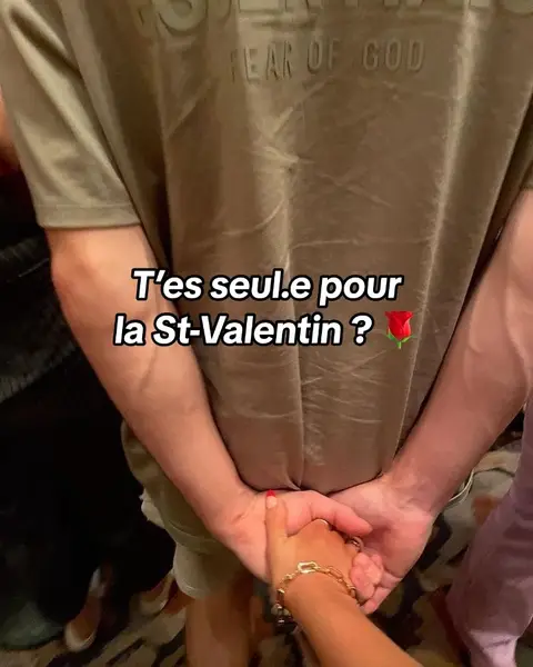 The cover image shows a scene where two people are holding hands. On the right is a man wearing a t-shirt, and on the left is a woman whose arm can be seen holding the man's hand. The background is slightly blurred, implying an indoor setting. A text overlay is on top.
