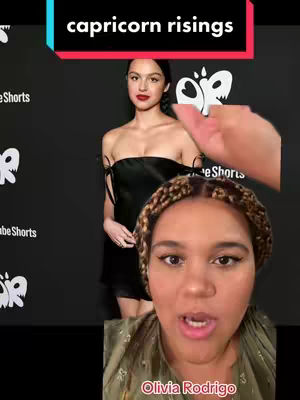 The image is a vertical split screen. The bottom half of the screen shows a close-up face of a person with braided hair, gazing forward and speaking. A woman, Olivia Rodrigo, is featured in the left half looking directly into the camera, wearing a black dress. The top of the screen is overlayed with text on a red and black background. A hand is visible in the upper right appearing to be holding the phone.