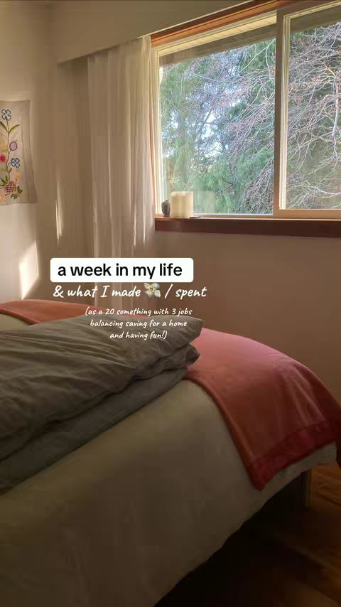 The image showcases a bedroom scene with a bed covered in a gray blanket and a coral-colored throw blanket. A window is open on the right, with trees visible outside. Text overlays are positioned on the bed.