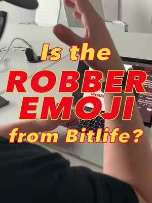 A person is working on a laptop with the camera pointed at the laptop keyboard and the person pointing at it. Overlaid with text is in bold yellow with a red drop shadow.