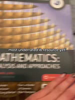 The cover image shows a math textbook with a spiral shape on the top and a hand on the edge. A text overlay is visible at the bottom.
