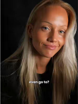A close-up shot of a woman with long blonde hair, gazing towards the camera with a slight smile. The background is a dark, solid color. The text overlayed asks "even go to?"
