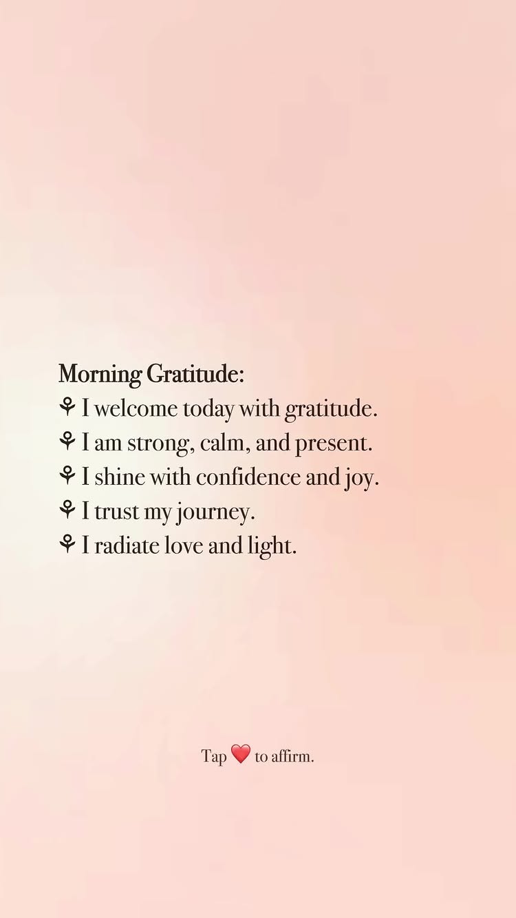 The image features a soft, peachy-pink background. Text is displayed in a clean, sans-serif font in black. The text includes affirmations and gratitude statements, with a heart graphic.