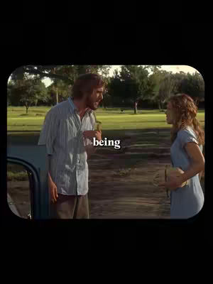 A scene from the movie "The Notebook" shows a man and a woman in an outdoor setting. The man is standing by a car with the door open, gesturing and speaking animatedly. The woman stands facing him, listening intently. The scene is framed with a cinematic aspect ratio, and the background shows a park-like setting. The text "being" is overlaid near the man.