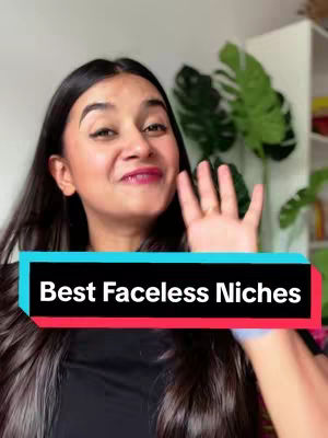 A woman with dark hair smiles, waving her right hand towards the camera. A black and teal colored text overlay displays the title 'Best Faceless Niches'. The background includes a green plant and a white shelf.
