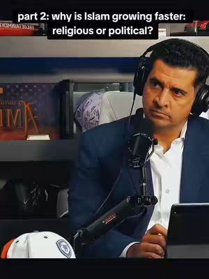 The cover image features a man in a suit jacket, white shirt, and headphones, seated in what looks like a studio setting. He is positioned behind a microphone with a serious expression, suggesting he is discussing a serious topics. Above him is a text overlay.