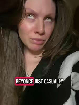 A woman looks upwards with a slightly quizzical or exasperated expression, against a dark background. The hook text overlayed in a rectangular box reads 'BEYONCE JUST CASUALLY'.