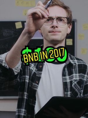 A young man with glasses, wearing a plaid shirt and a white t-shirt, holds a pen as if drawing on something in front of him. He is standing in front of a light-colored wall with post-it notes and a dark board to his left. Overlayed on the image is a pop-out design with the text "$100 BNB IN 2017".