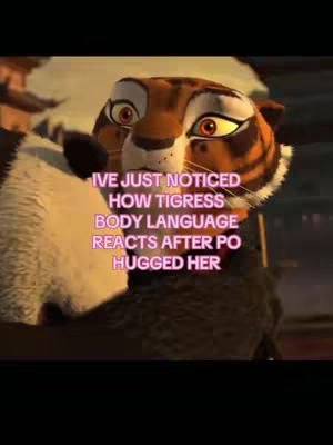 The image shows a close-up of the animated character Tigress's face from the Kung Fu Panda movie. Overlayed text in a pinkish-purple color is positioned over the character's face. The background suggests a darker, shadowy setting, with hints of other characters or objects.