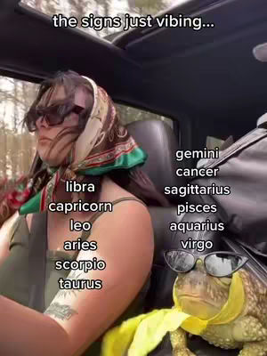 The cover shows a person in a car with different zodiac signs overlaid.