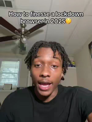 The cover image shows a young Black man in a close-up shot. He has short, dark, textured hair. He is wearing a black t-shirt. The background is a room with a ceiling fan and a window. Text overlayed at the top reads, "How to finesse a lockdown browser in 2025" and uses an emoji of a thinking face.