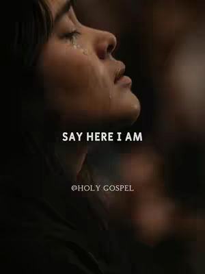 A close-up of a woman's face in profile, looking upwards with a tear rolling down her cheek. Text overlays appear on the image.