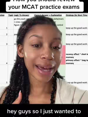 A young woman with long black curly hair and a white top is centered in frame, speaking and gesturing. Behind her, a whiteboard displays text related to reviewing MCAT practice exams. The background has a light green color, and a pink bar to the right.