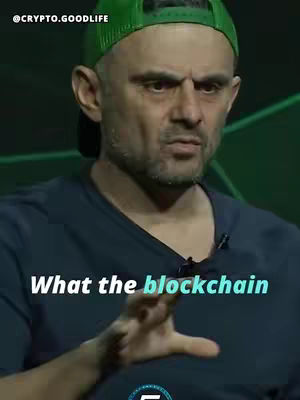 A man wearing a green cap and a dark blue shirt is looking at the camera with a serious expression. Text overlay at the bottom reads, What the blockchain.