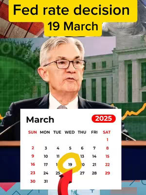 The image features a composite graphic related to financial news. At the top, a yellow bar displays the text 'Fed rate decision 19 March'. Below this is an image of a man with glasses. Underneath him is a calendar for March 2025, where the date '19' is highlighted with a yellow circle and an arrow pointing to it. The background includes blurred elements of buildings and what appears to be a stock market graph.