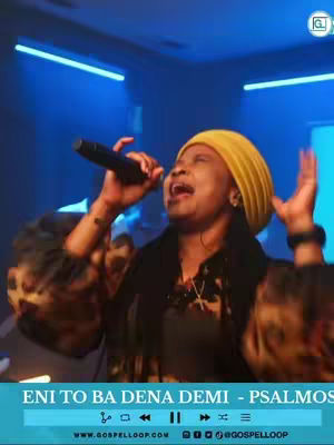 The cover image showcases a female singer passionately performing on stage. She wears a yellow head covering, has a microphone in hand, and raises the other arm. The scene is lit with blue lighting.