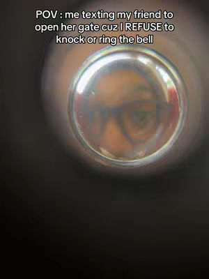 Cover image shows a close up view from a peephole, with a distorted reflection of a person. Above the peephole is the text overlayed in white.