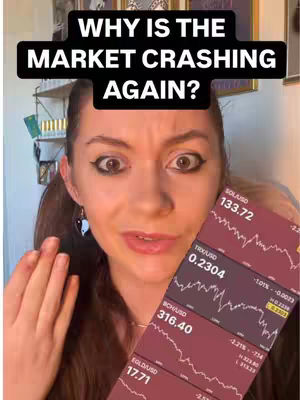 A woman with a concerned expression holds a phone displaying cryptocurrency market data. Overlay text in a black box reads, "WHY IS THE MARKET CRASHING AGAIN?"