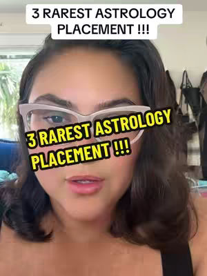 A woman with dark hair and glasses is centered in the frame. Two text overlays reads "3 RAREST ASTROLOGY PLACEMENT !!!" in white and yellow text.